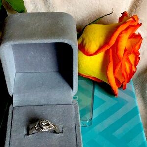 Stunning designer diamond and silver ring